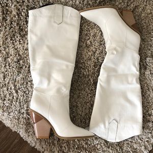 Knee high white cowboy boots!